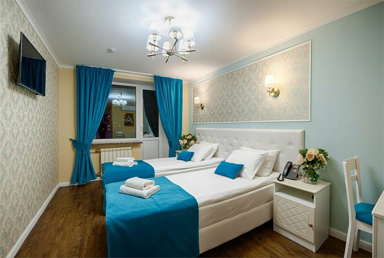 Стандартный номер с двумя раздельными кроватями или одной двуспальной кроватью